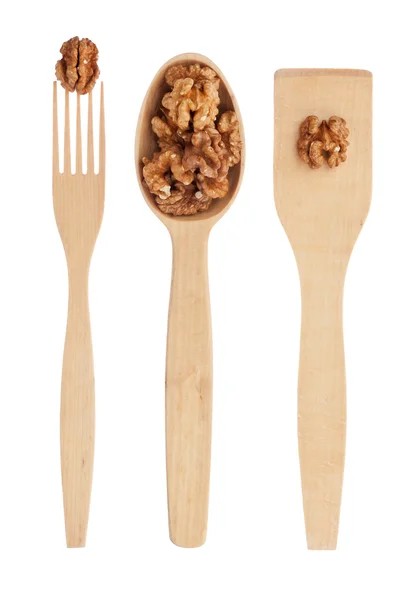Wooden spoon,fork, shovel with walnut — Stock Photo, Image