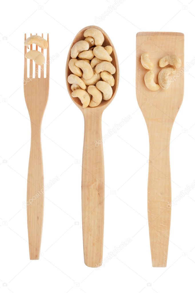 Wooden spoon,fork, shovel with cashew