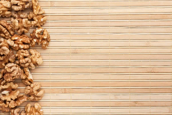 Walnut is on a bamboo mat — Stock Photo, Image