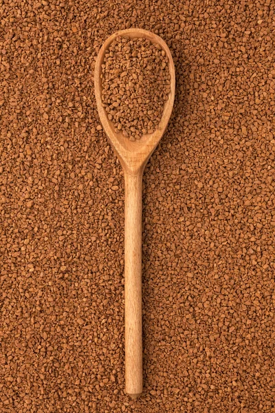 Wooden spoon with granulated coffee — Stock Photo, Image