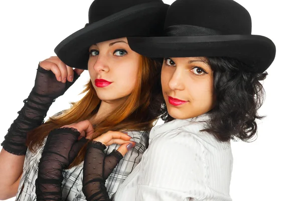 Dwie dziewczyny w czapki i rękawice — Zdjęcie stockowe