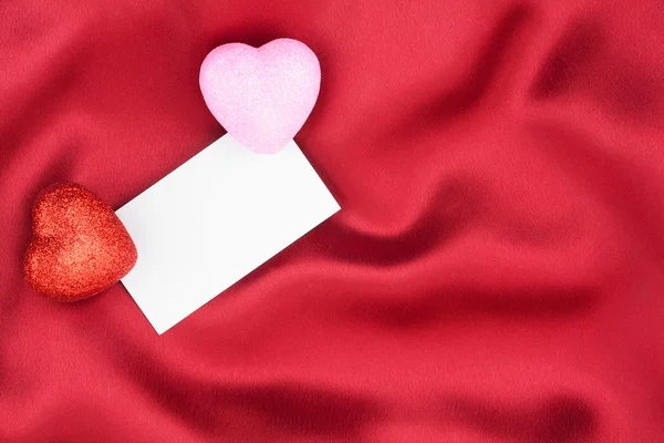 Red and pink heart with a white card — Stock Photo, Image