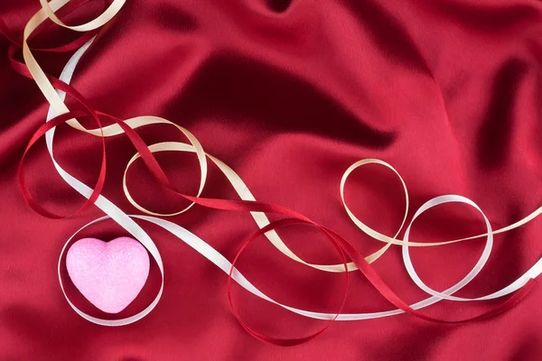 Pink heart and satin ribbons — Stock Photo, Image