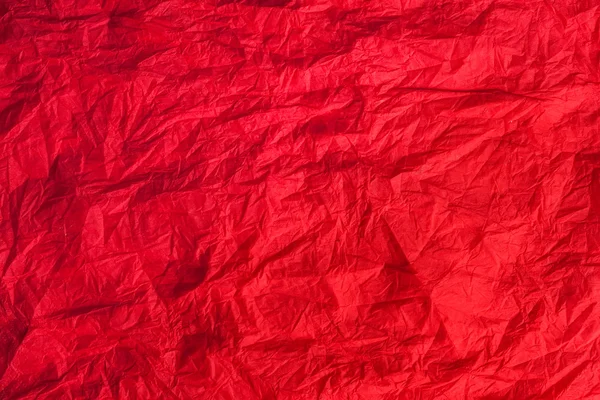 Red crumpled paper, can be used as background — Stock Photo, Image