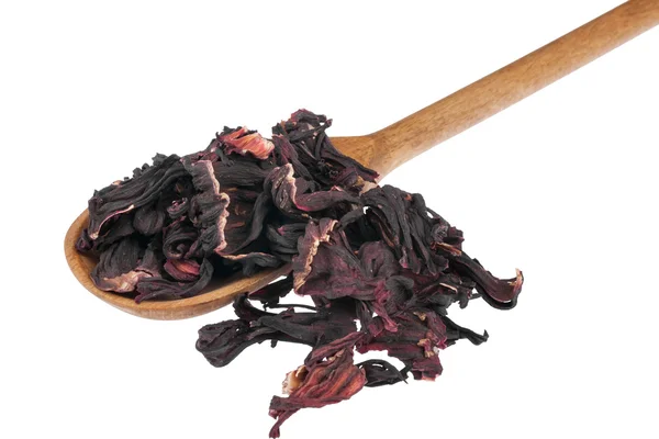 Wooden spoon with dried hibiscus — Stock Photo, Image