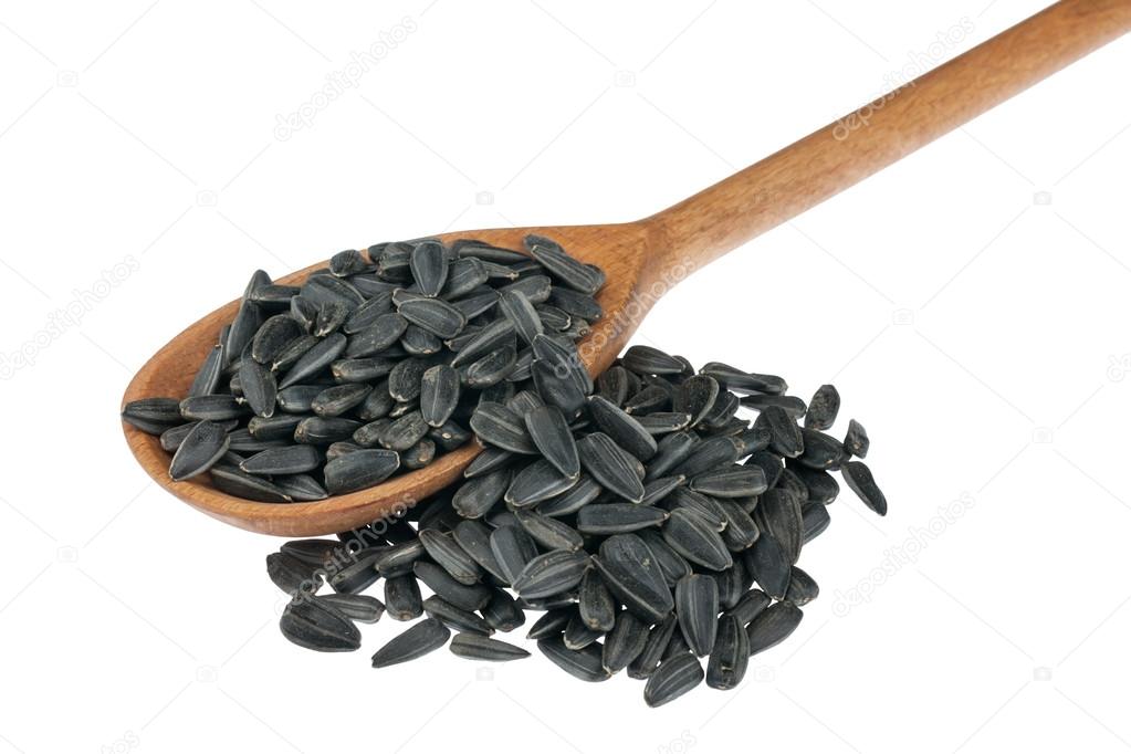 wooden spoon with sunflower seeds
