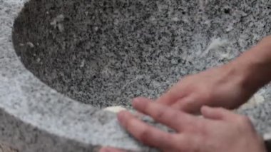 Japanese New Year's Food Tradition, Beating Rice Cakes in a Big Stone Bowl