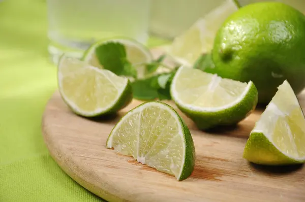 Fresh cut limes — Stock Photo, Image