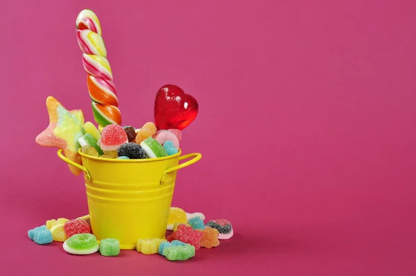 Candies in bucket — Stock Photo, Image