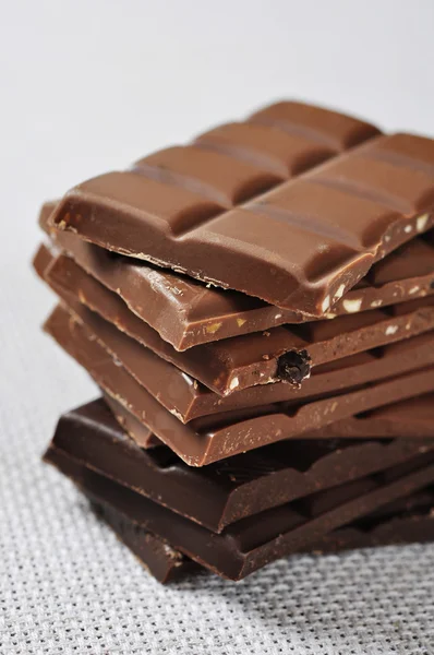 Stacked assorted chocolate — Stock Photo, Image