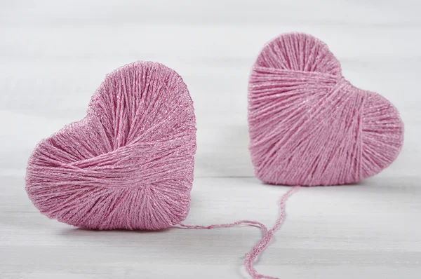 Two pink clews in shape of heart — Stock Photo, Image