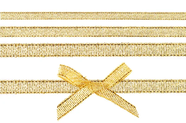 Gold bow and gold ribbons — Stock Photo, Image