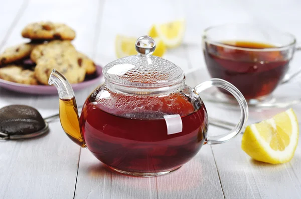 Cup of tea with teapot — Stock Photo, Image