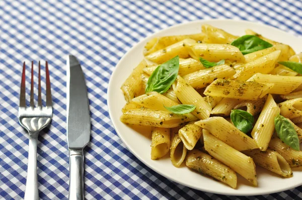 Pasta with pesto sauce — Stock Photo, Image