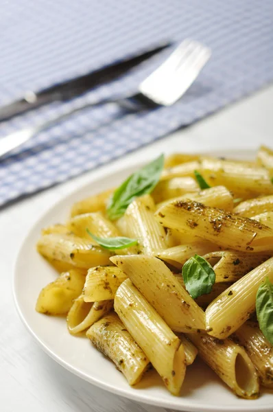 Pasta with pesto sauce — Stock Photo, Image