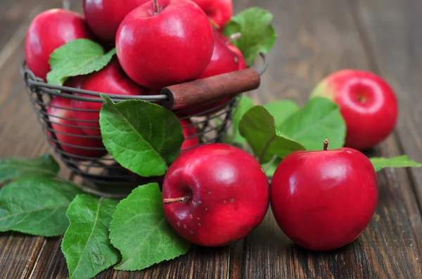 Apples in metal basket — Stock Photo, Image