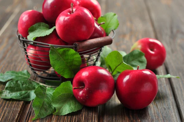 Apples in metal basket — Stock Photo, Image