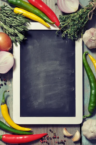 Slate board with fresh vegetables — Stock Photo, Image