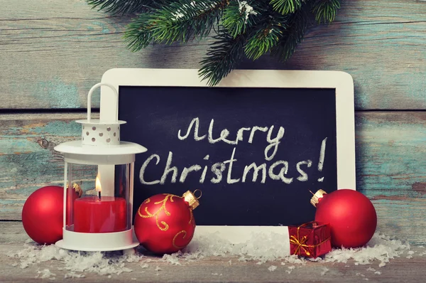 Christmas decoration and framed blackboard — Stock Photo, Image