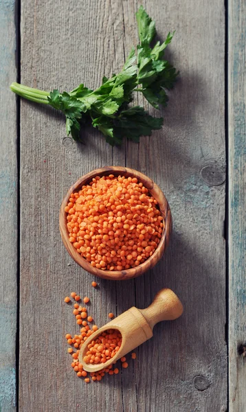 Lentils in wooden bowl — Stock Photo, Image