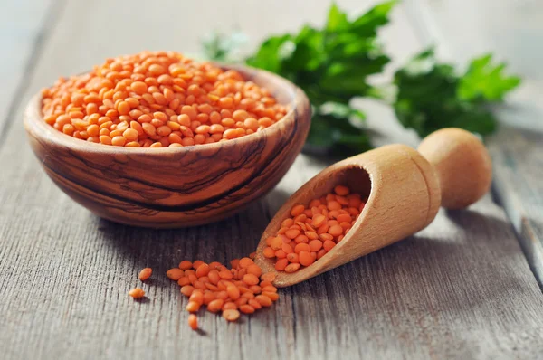 Lentils in wooden bowl — Stock Photo, Image