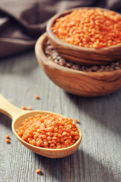 Lentils in wooden bowl — Stock Photo, Image