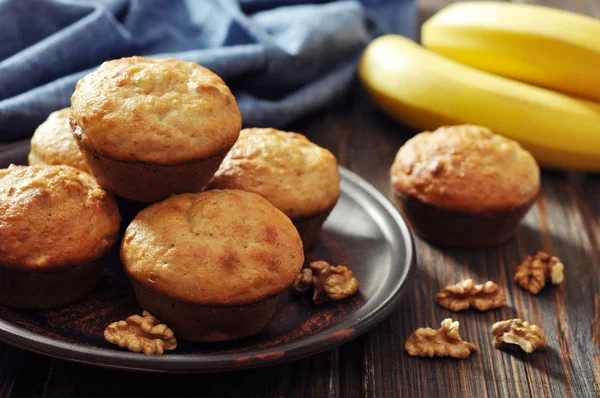 Banana muffins on brown plate — Stock Photo, Image