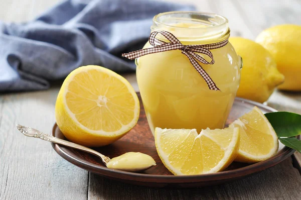 Lemon curd in glass jar — Stock Photo, Image