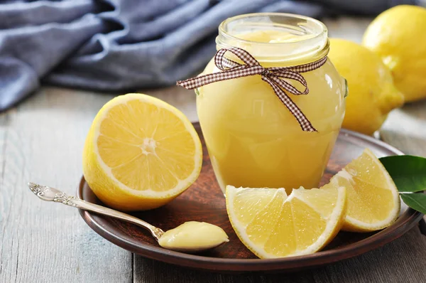 Lemon curd in glass jar — Stock Photo, Image