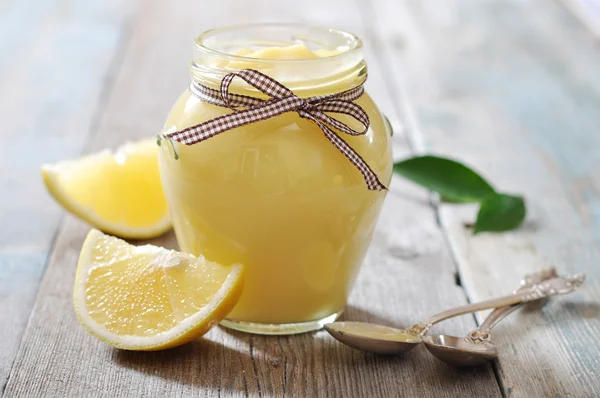 Lemon curd in glass jar — Stock Photo, Image