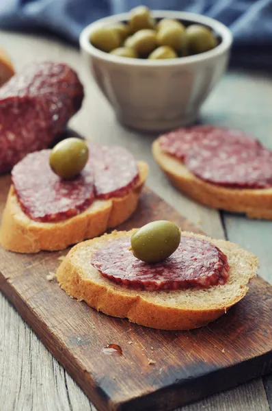 Canape with salami — Stock Photo, Image