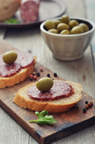 Canape with salami — Stock Photo, Image