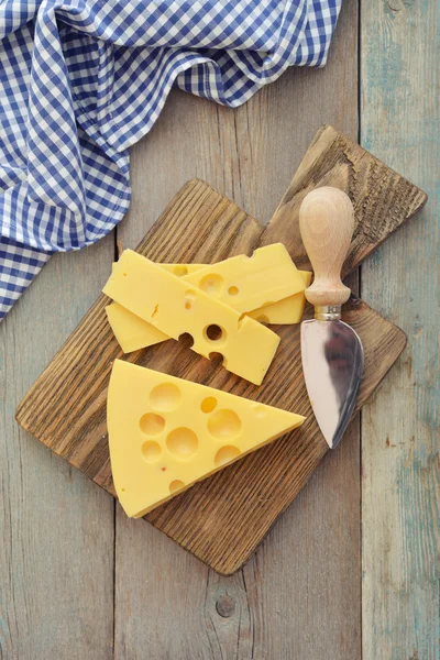 Cheese with big holes — Stock Photo, Image