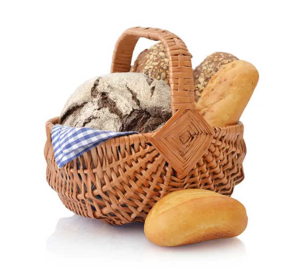 Bread and rolls in wicker basket — Stock Photo, Image