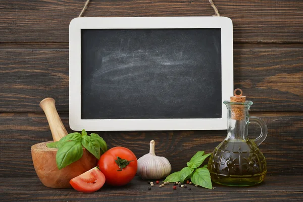 Blackboard with food ingredients — Stock Photo, Image
