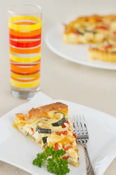 Slice of vegetable quiche — Stock Photo, Image