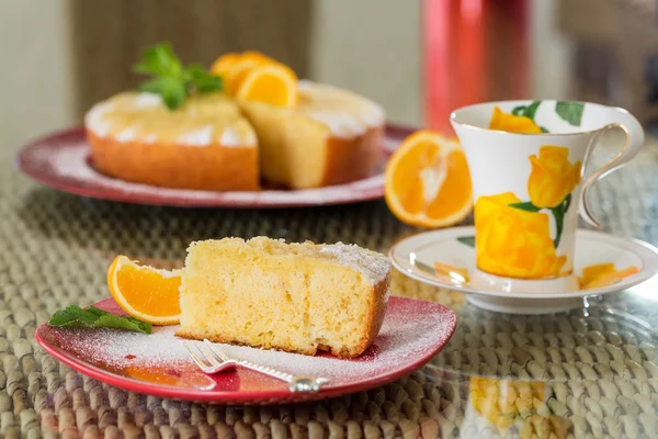 Slice of freshly cooked orange cake — Stock Photo, Image