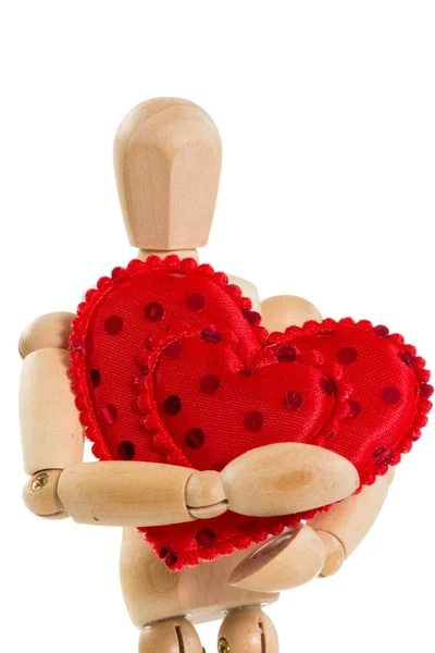 Wooden mannequin holding red heart, isolated — Stock Photo, Image