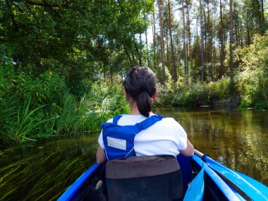 Canoeing on a picturesque little river