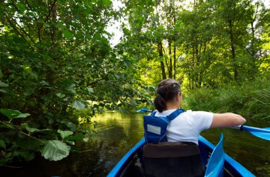 Canoeing on a picturesque little river