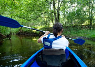 Canoeing on a picturesque little river