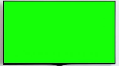 Modern ev iç mekanında boş yeşil ekranlı televizyon oturma odasında. Uzaklaş. Program ve filmlerle çevrimiçi yayın platformlarının ve hizmetlerin reklamı ve pazarlanması için ideal