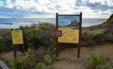 CALIFORNIA, USA - NOVEMBER 29, 2019: information plate CRISTAL COVE STATE MARINE CONSERVATION AREA, California