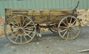 CALIFORNIA, USA - NOVEMBER 29, 2019: an old cart from the times of westernization and cowboys in the interior near a store in California