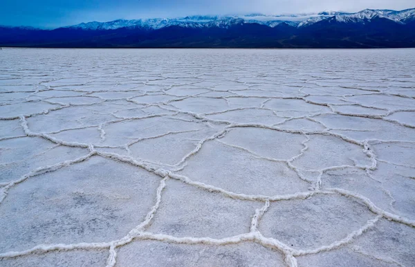 Death Valley National Park, Salt with clay, California. Smooth salt valley with cracked and swollen salt, dead salt landscape
