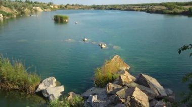 Flooded granite quarry. Freshwater lake
