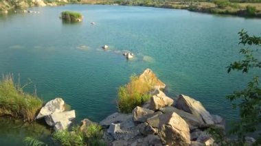 Flooded granite quarry. Freshwater lake