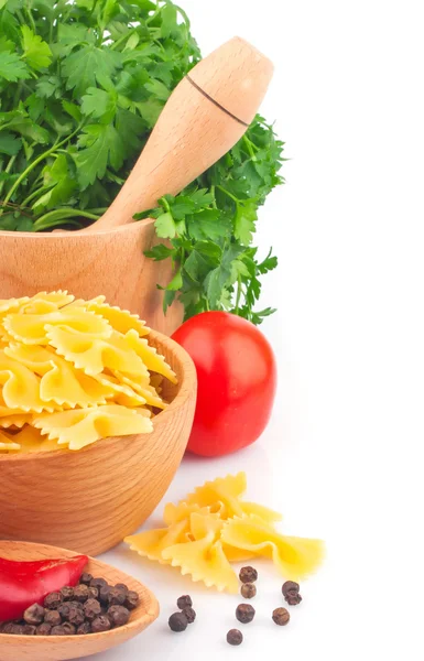 Pasta in bowl and vegetable — Stock Photo, Image