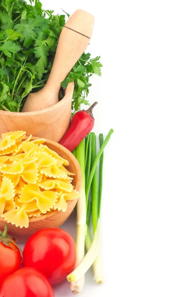 Pasta in bowl and vegetable — Stock Photo, Image