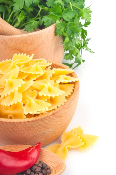 Pasta in bowl and vegetable — Stock Photo, Image